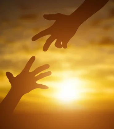 silhouette-of-giving-a-help-hand-hope-and-support-2025-01-08-12-51-38-utc